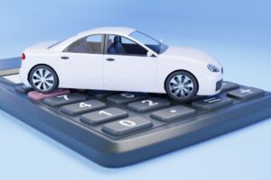 calcolatrice con sopra macchinina