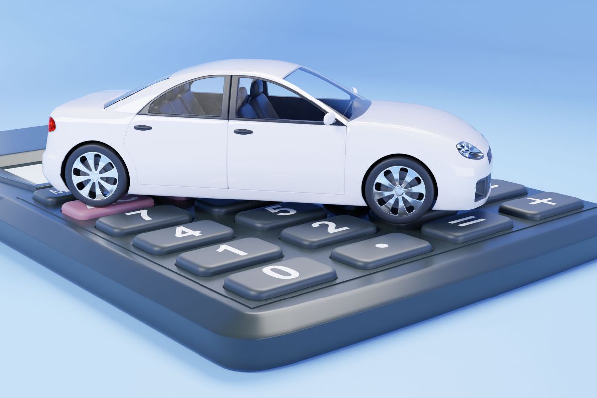 calcolatrice con sopra macchinina