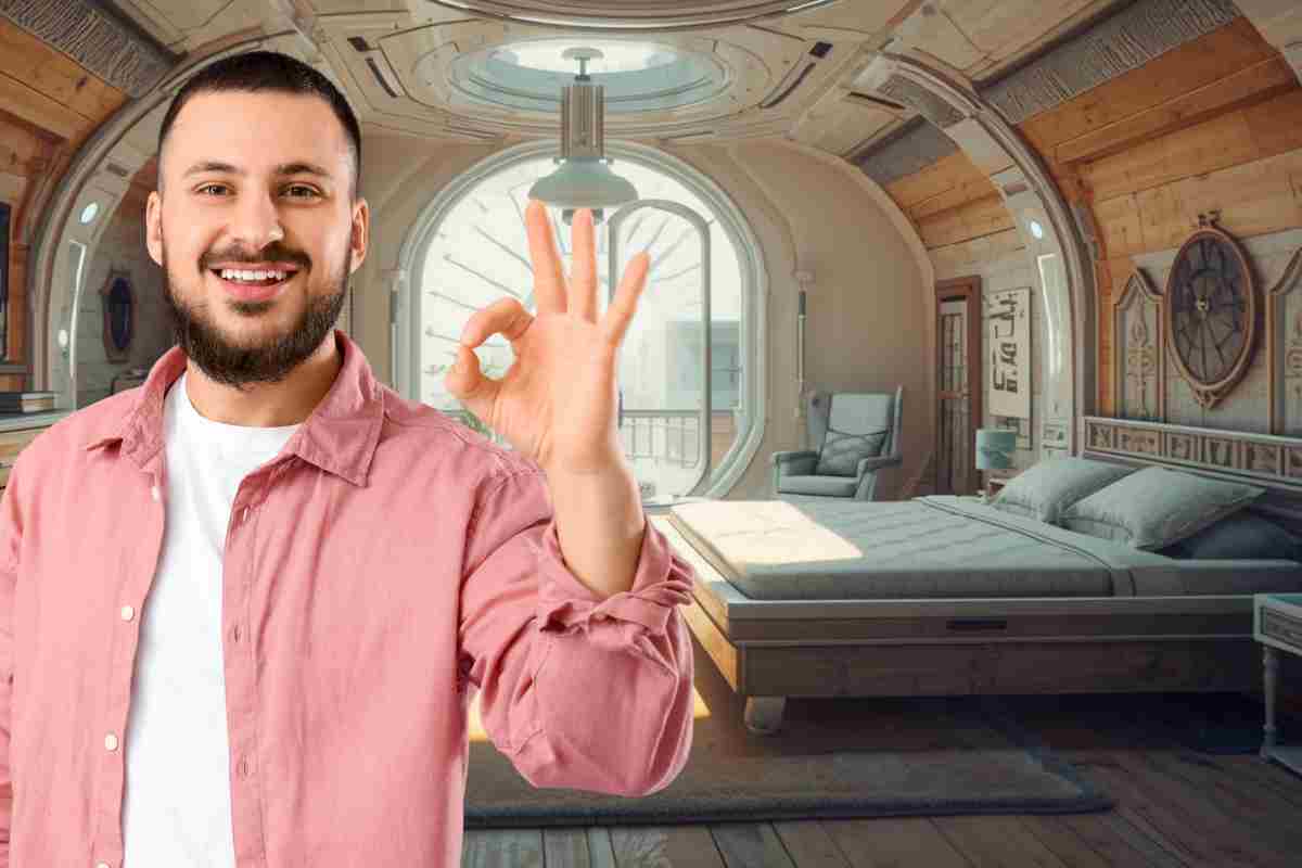 persona fa ok e sullo sfondo una casa con ambienti rimodulati