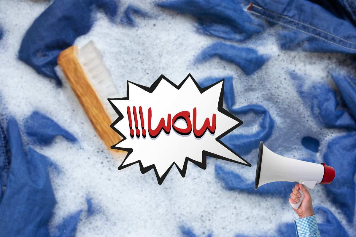 jeans in ammollo e scritta wow che esce da un megafono